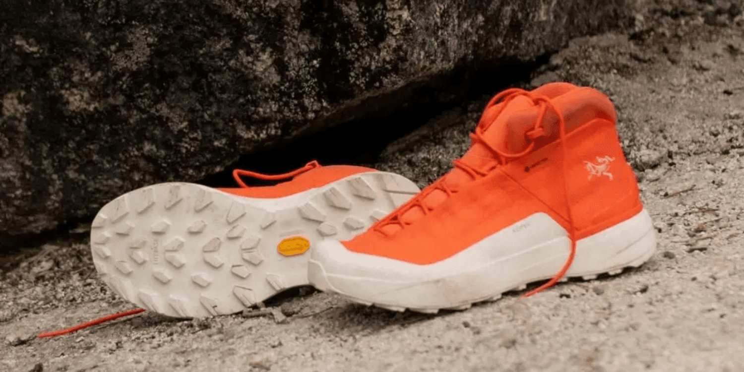 orange and white arc'teryx sneakers