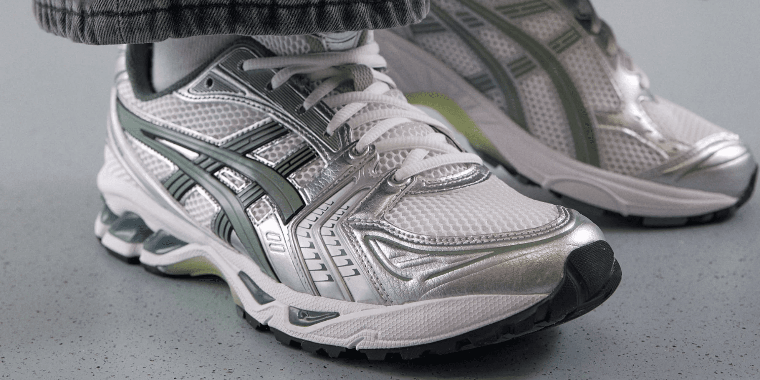 silver and green ASICS Gel-Kayano