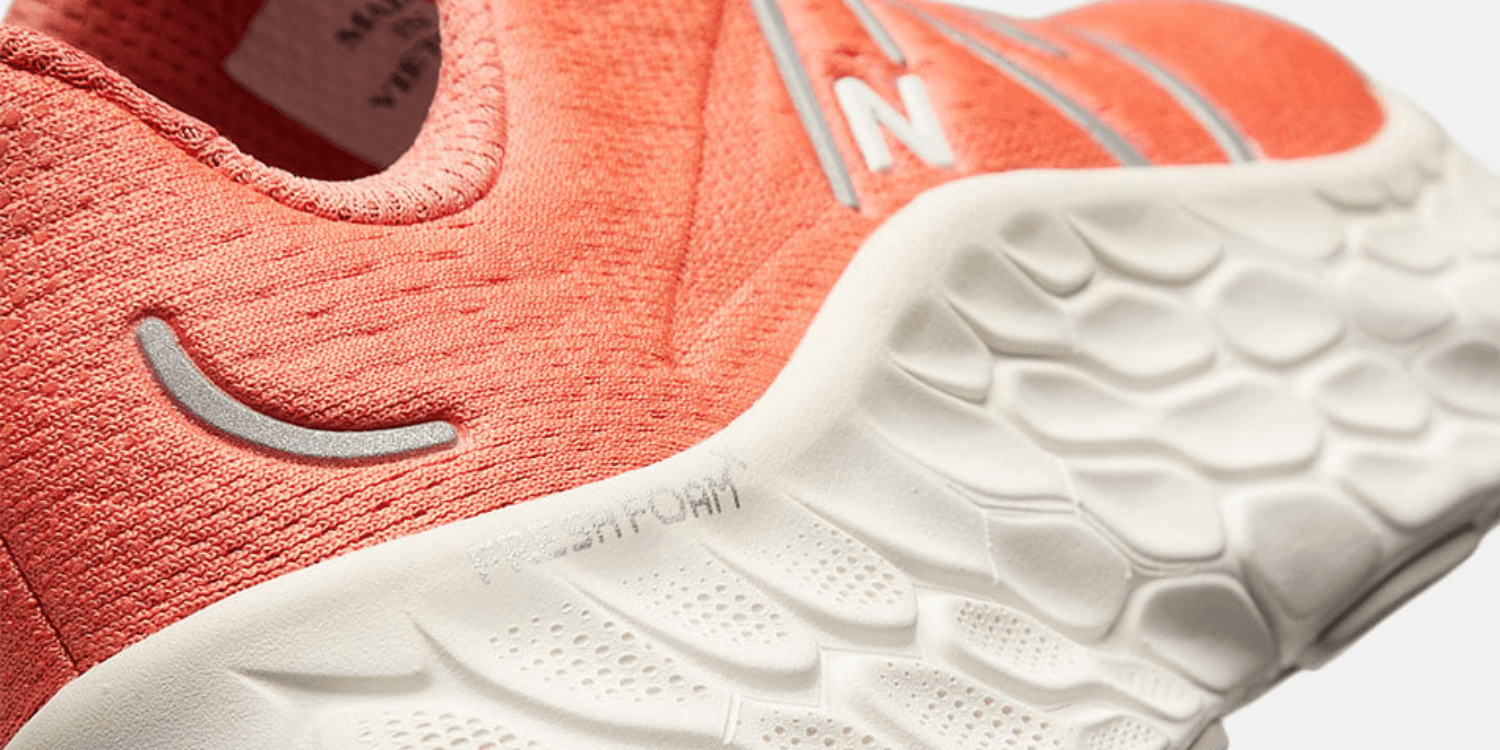 orange New Balance Fresh Foam X More closeup