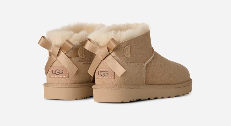 UGG® Ultra Mini Bailey Bow Boot 'Sand'